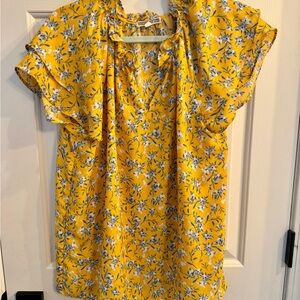 Yellow dressy work blouse with short ruffle sleeves